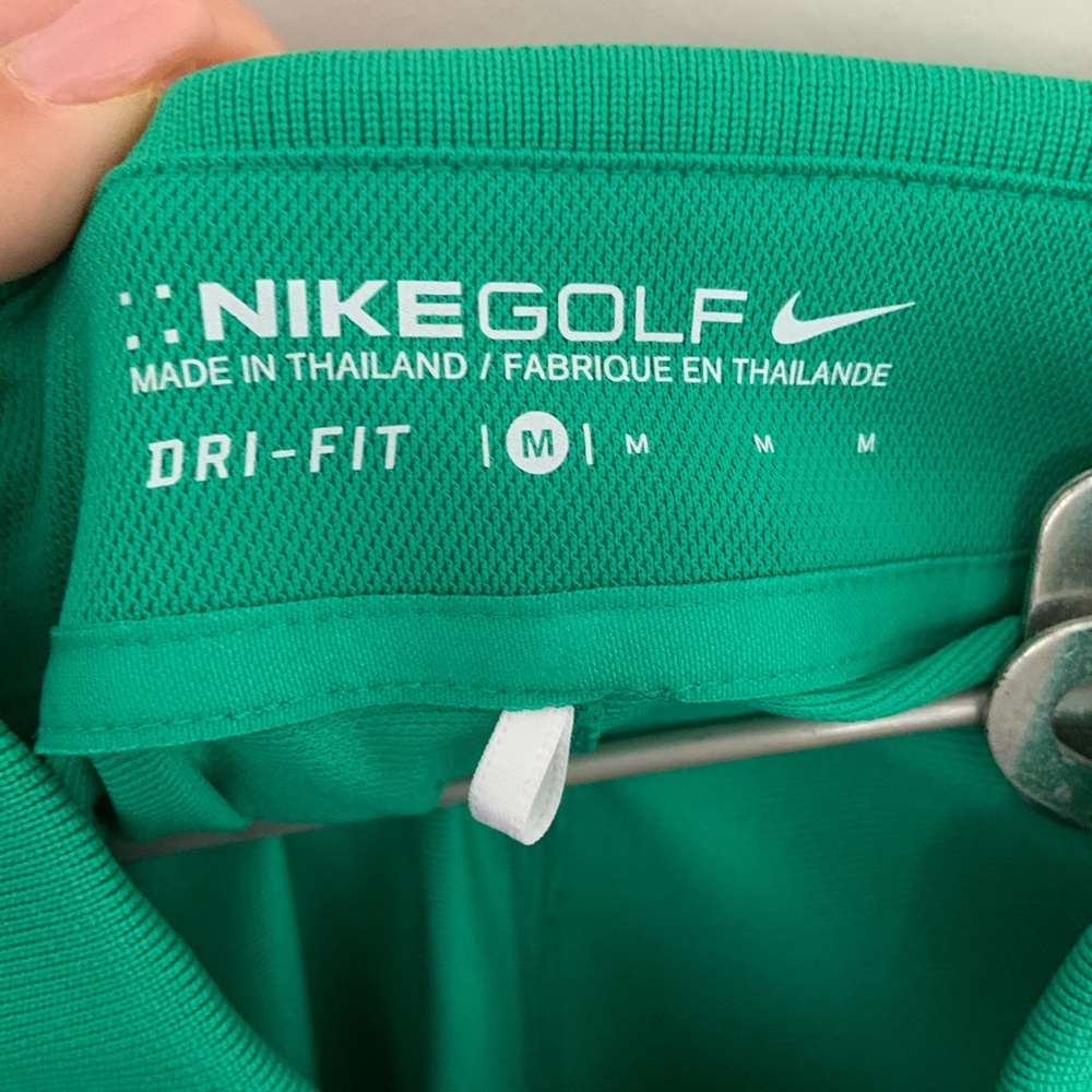 Women’s Nike Dri Fit polo. New without tags